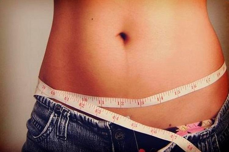 barriga mulher inchaco fita metrica
