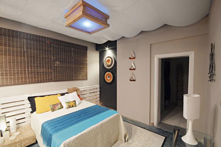 Quarto com cabeceira feita de pallet