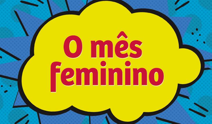placa nas cores azul, amarelo e vermelho com os dizeres o mes feminino escritos dentro de uma balão de fala